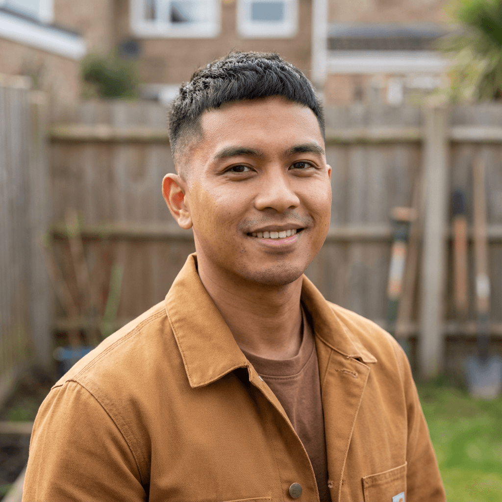 Mike Tran near a city bus